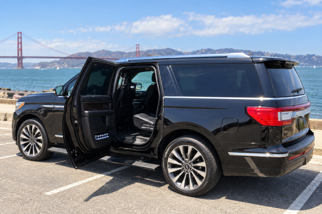 Lincoln Navigator L limo with rear door open, Golden Gate Bridge